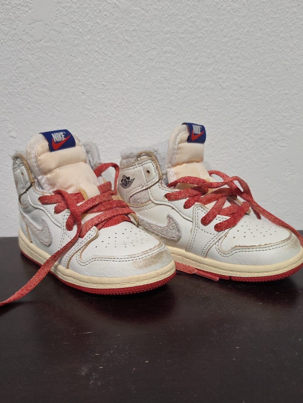 Nike Kids White Sneakers with Red Laces